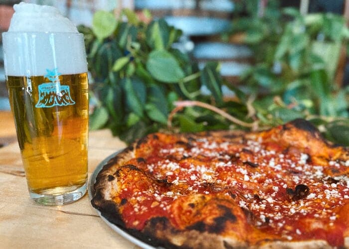 Pizza and beer? Together? Whoa. The future is now!